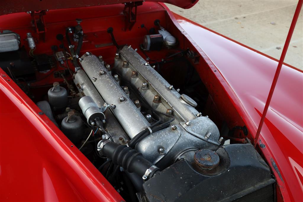 A 1955 Jaguar XK140 DHC